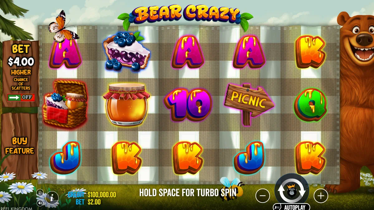 Bear Crazy by Pragmatic Play - main game interface showing 5x3 reel grid with honey-glazed symbols, picnic basket, honey jar, blueberry pie, picnic sign and grinning grizzly bear against a checkered picnic blanket background