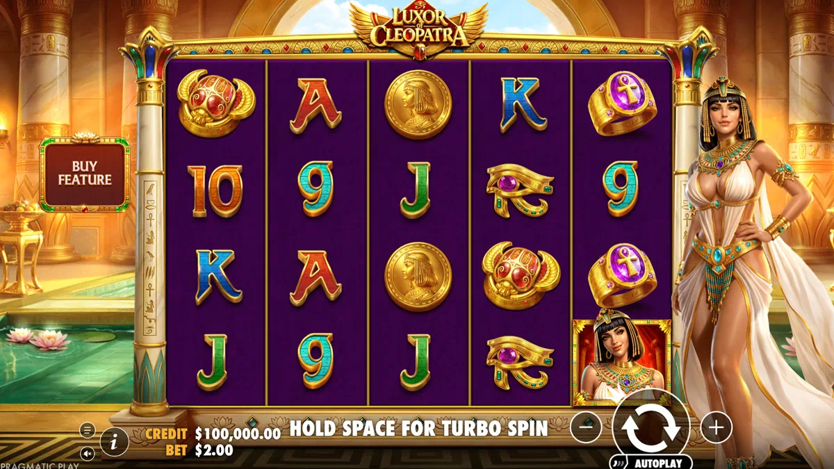 Luxor of Cleopatra by Pragmatic Play - main game interface showing 5x4 reel grid with Egyptian symbols, scarab, ankh ring, Cleopatra coin, Eye of Horus and card royals against a golden palace background